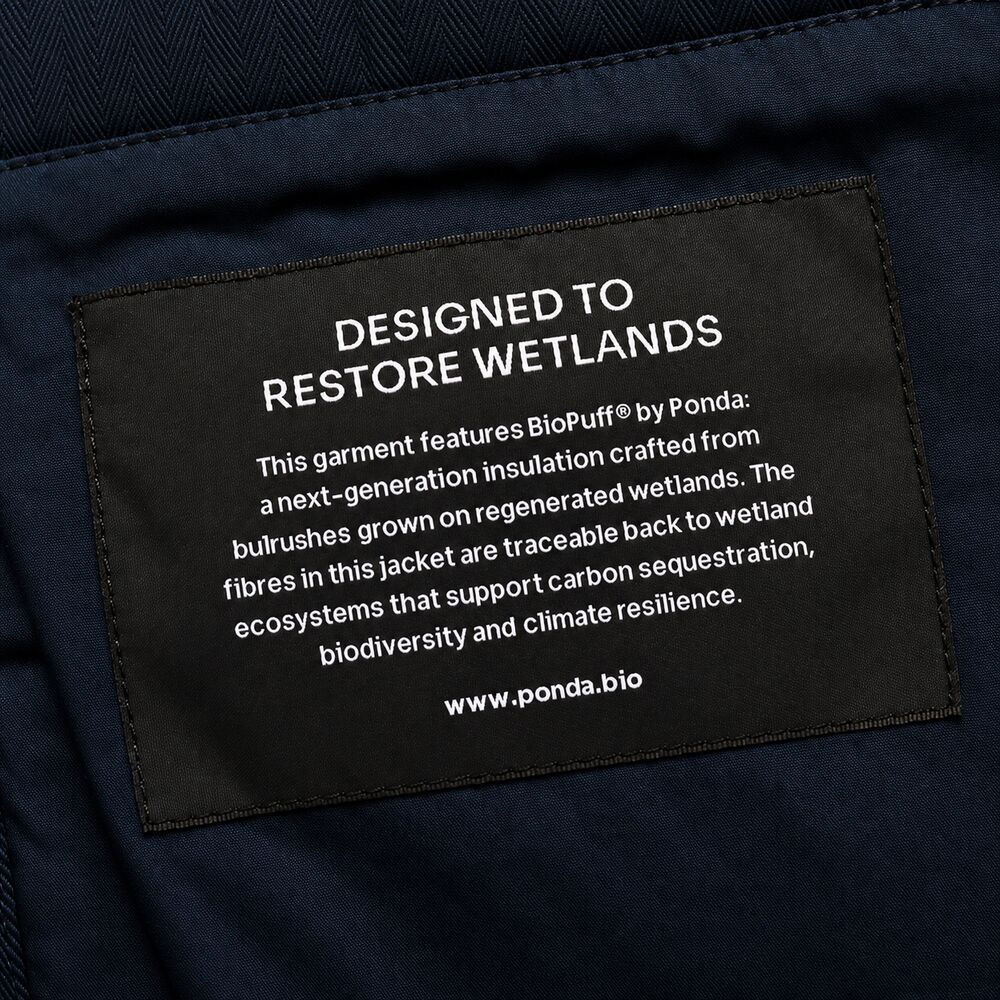 Inside label reading Designed to restore wetlands
